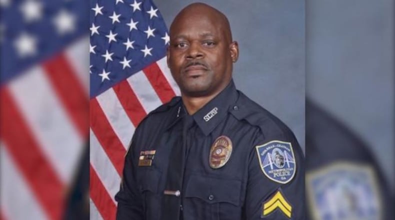 Officials said 50-year-old Savannah police Sgt. Kelvin Ansari was shot and killed as he arrived to investigate a barber shop robbery.