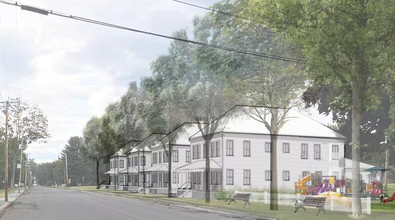 A rendering shows four apartment buildings envisioned on Weston Avenue in Madison, Maine. Two of the buildings have received approval through MaineHousing's rural affordable rental housing program.