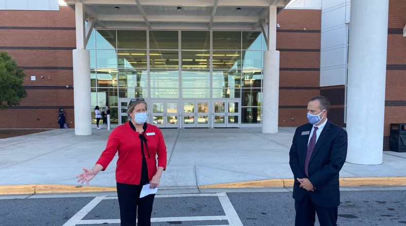 Gwinnett, Newton and Rockdale County Health Director Audrey Arona (left) praised Gwinnett County Public Schools for its phased-in return to in-person learning Friday.