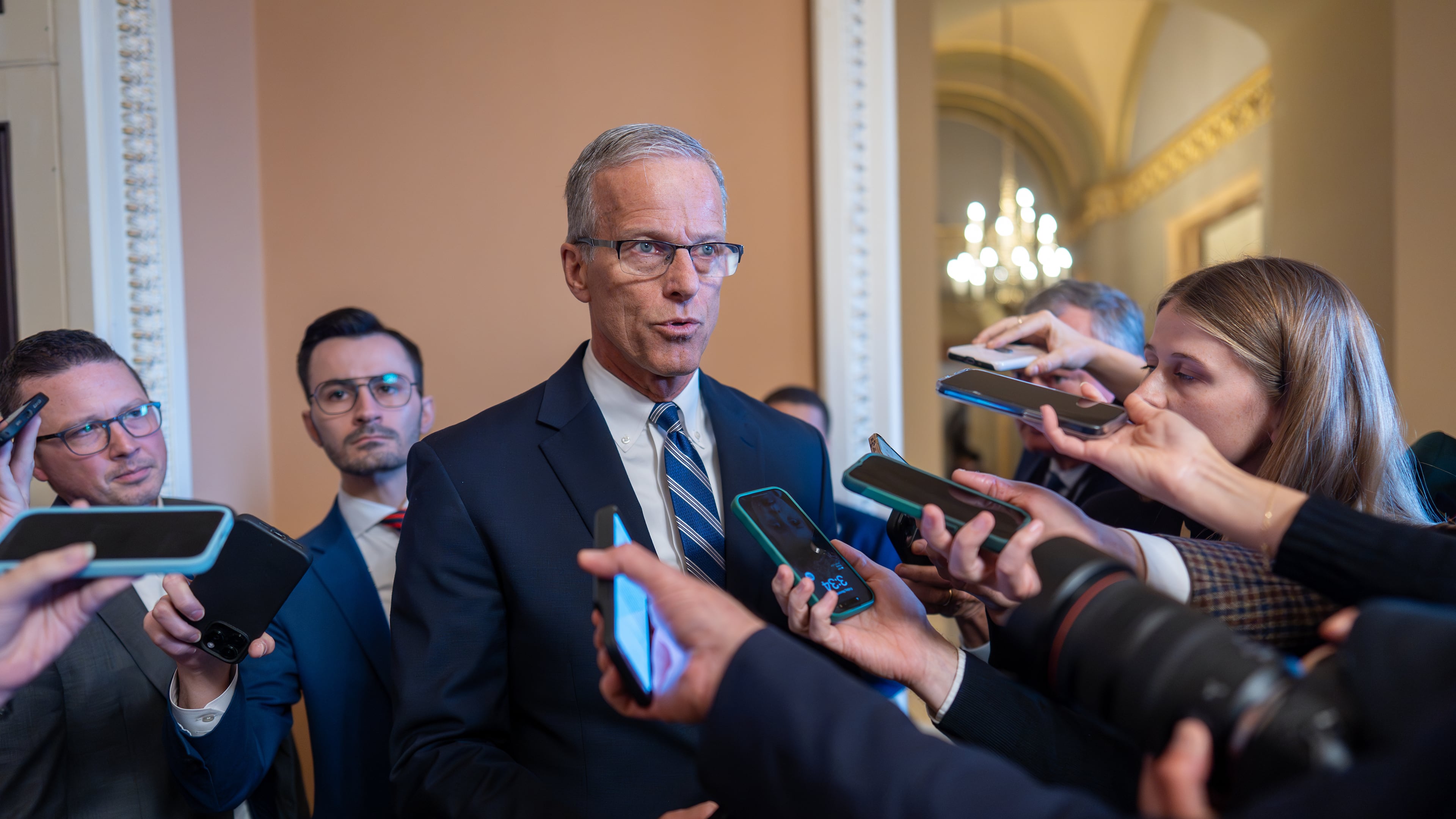 Speaking to reporters, Senate Majority Leader John Thune, R-S.D., responds to Senate Democratic Leader Chuck Schumer to reopen the government if Republicans extend expiring health care subsidies for one year, at the Capitol in Washington, Friday, Nov. 7, 2025, day 38 of the government shutdown. (AP Photo/J. Scott Applewhite)