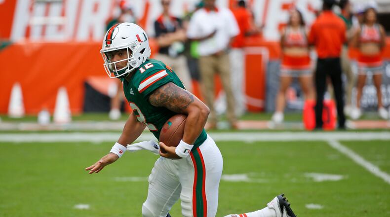 Miami quarterback Malik Rosier runs the ball during the first half of an NCAA College football game against Georgia Tech, Saturday, Oct. 14, 2017 in Miami Gardens, Fla. (AP Photo/Wilfredo Lee)