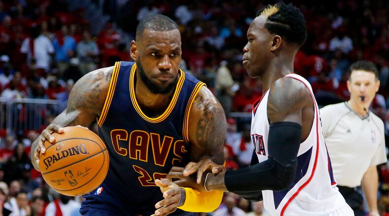 LeBron James drives against Dennis Schroder in Game One of the 2015 Eastern Conference Finals on May 20, 2015, at Philips Arena in Atlanta.