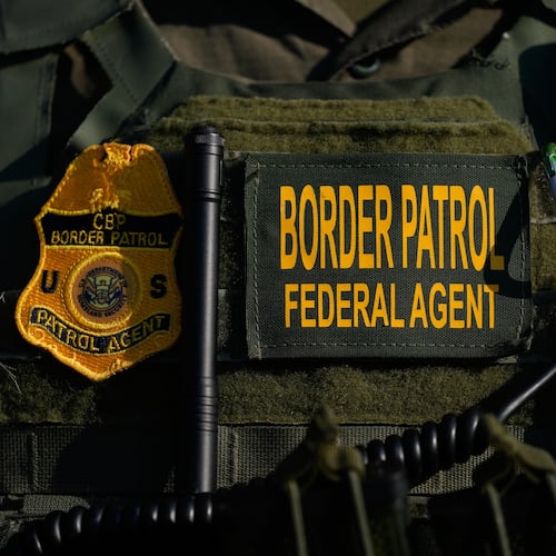 FILE - A Federal Patrol agent's badge is seen near an Immigration and Customs Enforcement facility in Broadview, Ill., Oct. 3, 2025. (AP Photo/Erin Hooley, File)