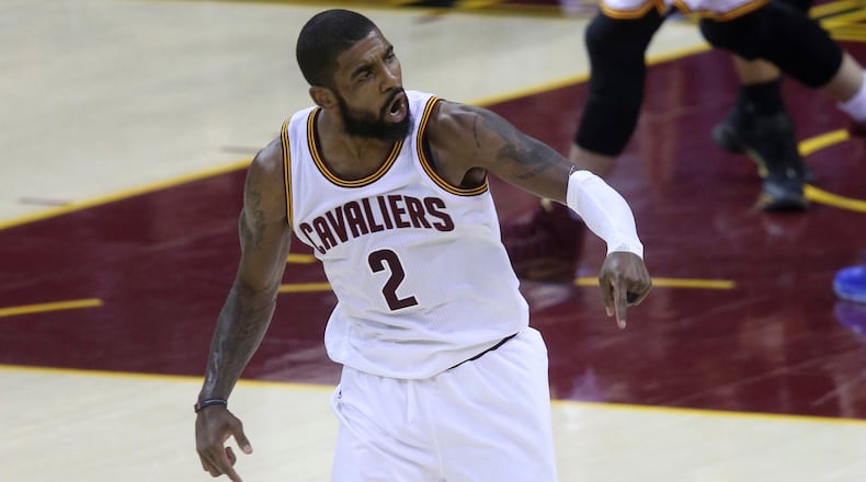 The Cleveland Cavaliers' Kyrie Irving reacts after hitting a three-point shot late in the fourth quarter against the Golden State Warriors during Game 4 of the NBA Finals at Quicken Loans Arena in Cleveland on Friday, June 9, 2017. Irving asked team owner Dan Gilbert to be traded. (Phil Masturzo/Akron Beacon Journal/TNS)