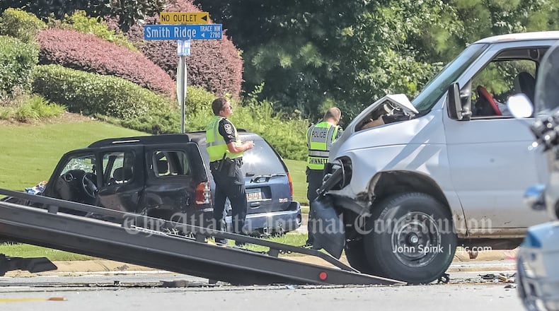 Authorities temporarily shut down all lanes of Buford Highway near Norcross after a deadly crash Monday morning.