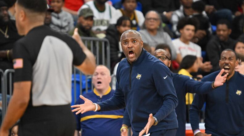 Wheeler head coach Larry Thompson reacts to a call during the second half of GHSA Class 7A Semifinal basketball game at GSU’s Convocation Center, Saturday, Mar. 2, 2024, in Atlanta. (Hyosub Shin / Hyosub.Shin@ajc.com)