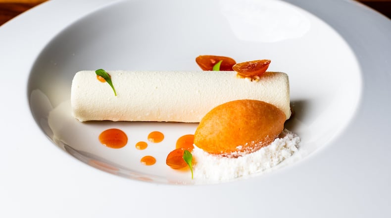 In the Creamsicle from Lazy Betty, a vanilla semifreddo is encased in a white chocolate shell and placed over a narrow sweet biscuit, and it comes with blood orange sorbet and orbs of kumquat gelee. CONTRIBUTED BY HENRI HOLLIS