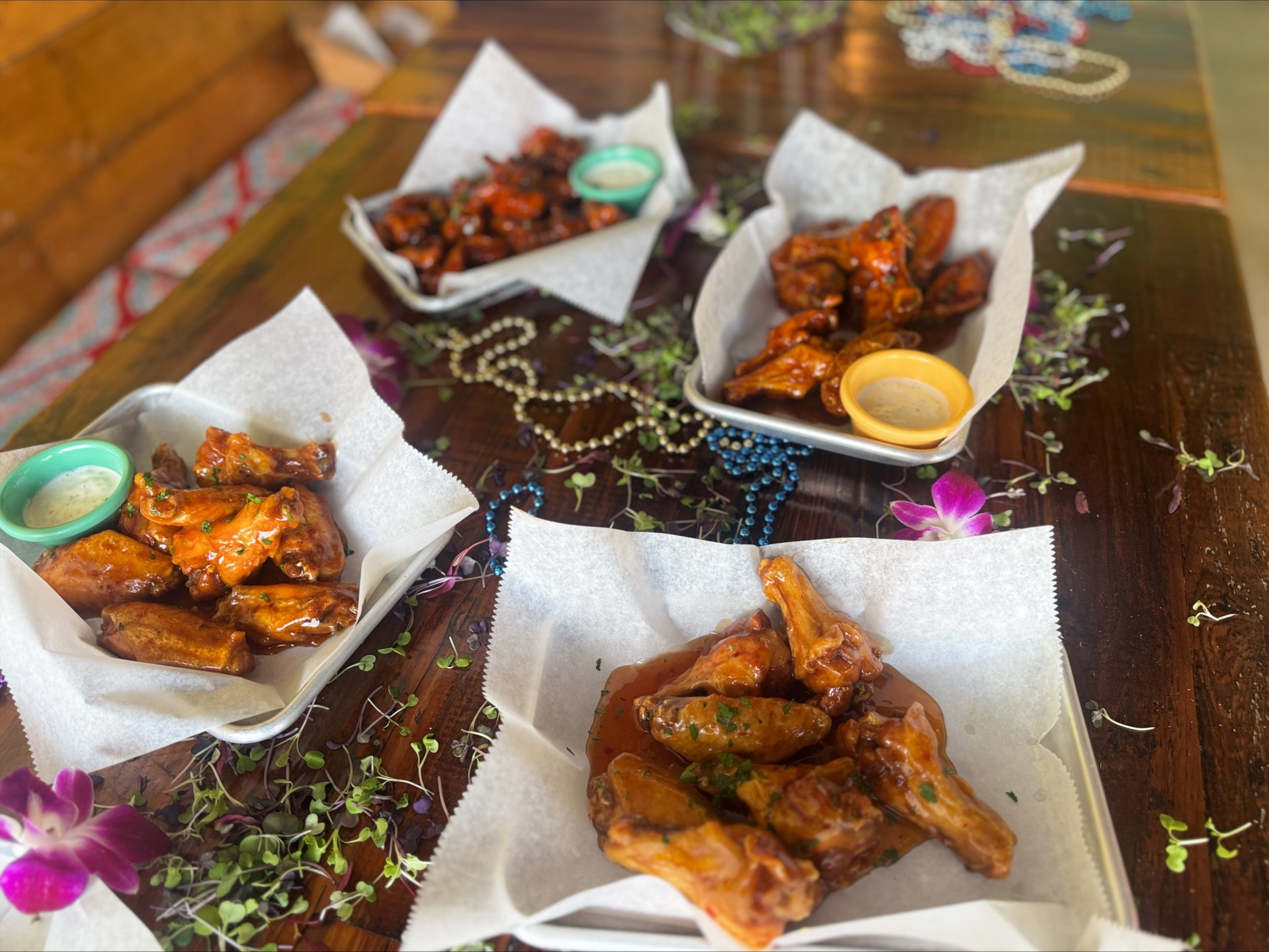 The team behind Caribbean restaurant Wylie & Rum also operates a late-night hot wing takeout concept called Atlanta Wing Co. (Courtesy of Wylie & Rum)