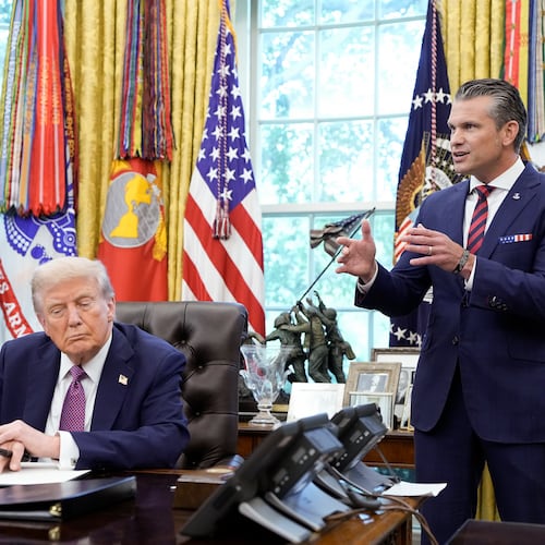 Secretary of Defense Pete Hegseth speaks alongside President Donald Trump during an event where Trump signed an executive order on renaming the Department of Defense in the Oval Office in Washington, on Friday, Sept. 5, 2025. Trump’s executive order authorizes the Department of Defense and the secretary of defense to be called the Department of War and the secretary of war. It is unclear how it will be formalized, given that Congress approved the name. (Haiyun Jiang/The New York Times)
