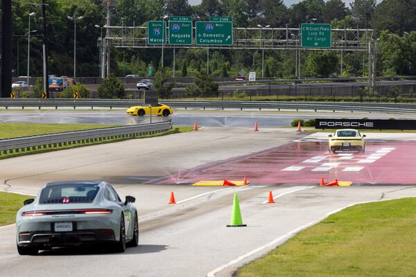 The roughly 60-acre Porsche Experience Center features Porsche’s North American headquarters, a fine dining restaurant, a restoration facility, a gallery with vintage vehicles and two test tracks. (Arvin Temkar/AJC)