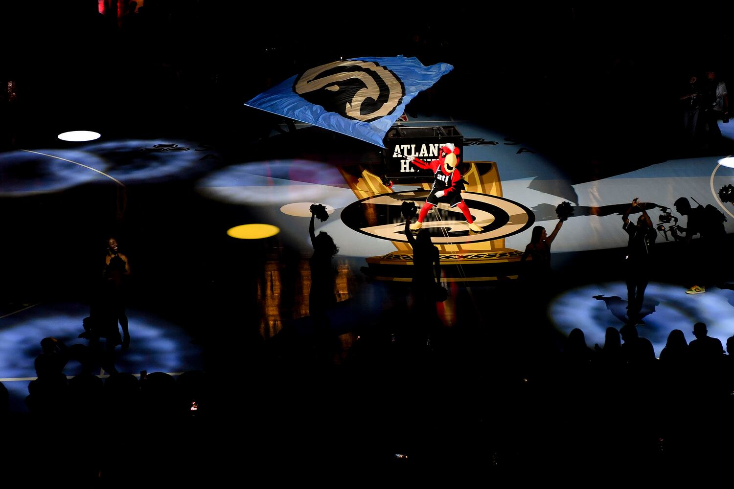 Harry the Hawk pumps the crowd up before the the start of the Atlanta Hawks’ game against the Indiana Pacers Tuesday, November 21, 2023 at State Farm Arena. (Daniel Varnado/For the AJC)