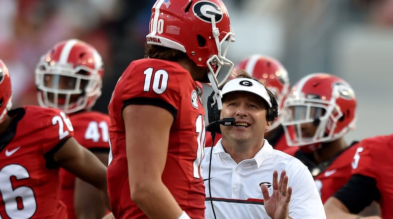 Georgia Bulldogs head coach Kirby Smart and quarterback Jacob Eason (10) are entering their second season in Athens.