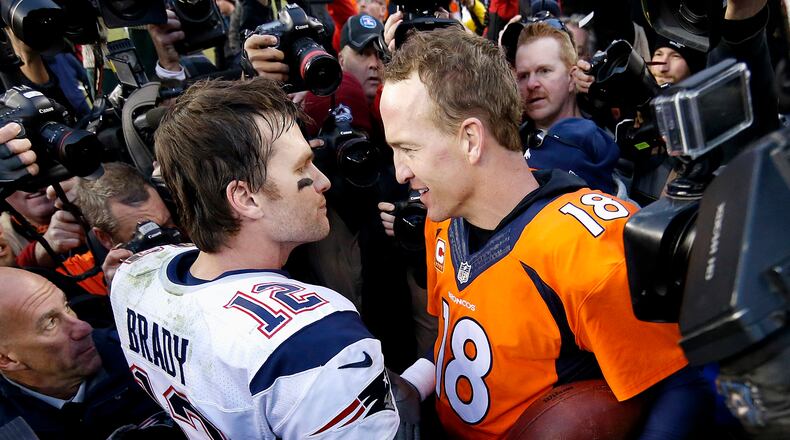 Tom Brady and Peyton Manning have met before in another venue - here the AFC Championship Game in January, 2016. They will not require padding when they compete again Sunday.  (AP Photo/David Zalubowski, File)