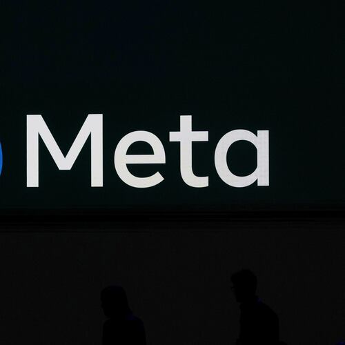 FILE - A Meta logo is shown on a video screen at LlamaCon 2025, an AI developer conference, in Menlo Park, Calif., April 29, 2025. (AP Photo/Jeff Chiu, File)
