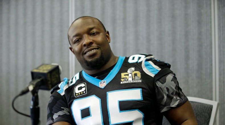 FILE - In this Feb. 7, 2015, file photo, Carolina Panthers defensive end Charles Johnson (95) is shown during a press conference in San Jose, Calif. The Carolina Panthers released longtime defensive end Charles Johnson on Thursday, a move that will save the team $11 million under the 2016 NFL salary cap. (AP Photo/Marcio Jose Sanchez, File)