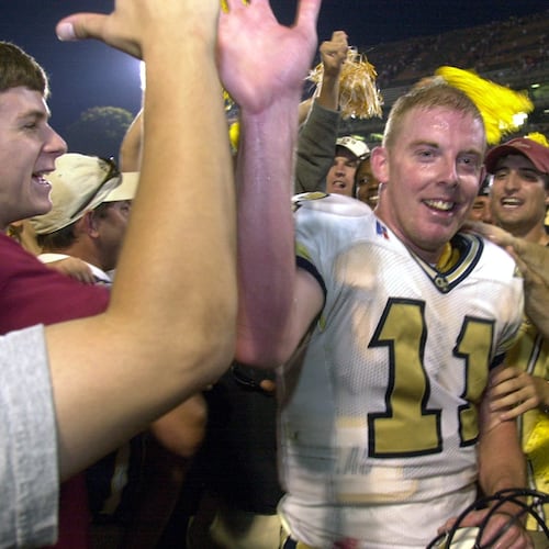 A former Georgia Tech quarterback, George Godsey played for the Yellow Jackets from 1998-2001 and was teammates with Brent Key, a former offensive lineman. (AJC 2000)