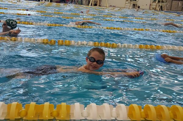 Jonas takes a lap during swim practice at the Cumming Aquatic Center. Contributed