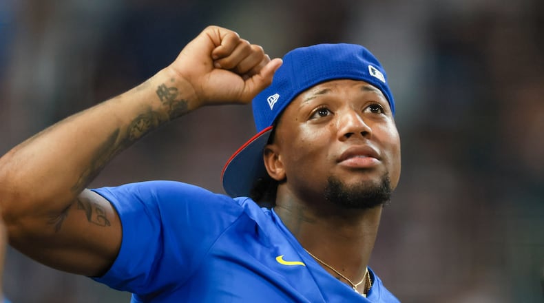 Atlanta Braves' Ronald Acuna Jr. cheers on teammate Matt Olson during the MLB Home Run Derby as part of the All-Star Game festivities on Monday, July 14, 2025, at Truist Park in Atlanta. (Jason Getz/AJC)