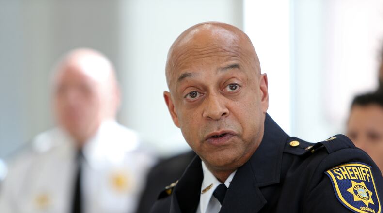 DeKalb County Sheriff Jeffrey L. Mann hosts a news conference in 2015. PHOTO / JASON GETZ