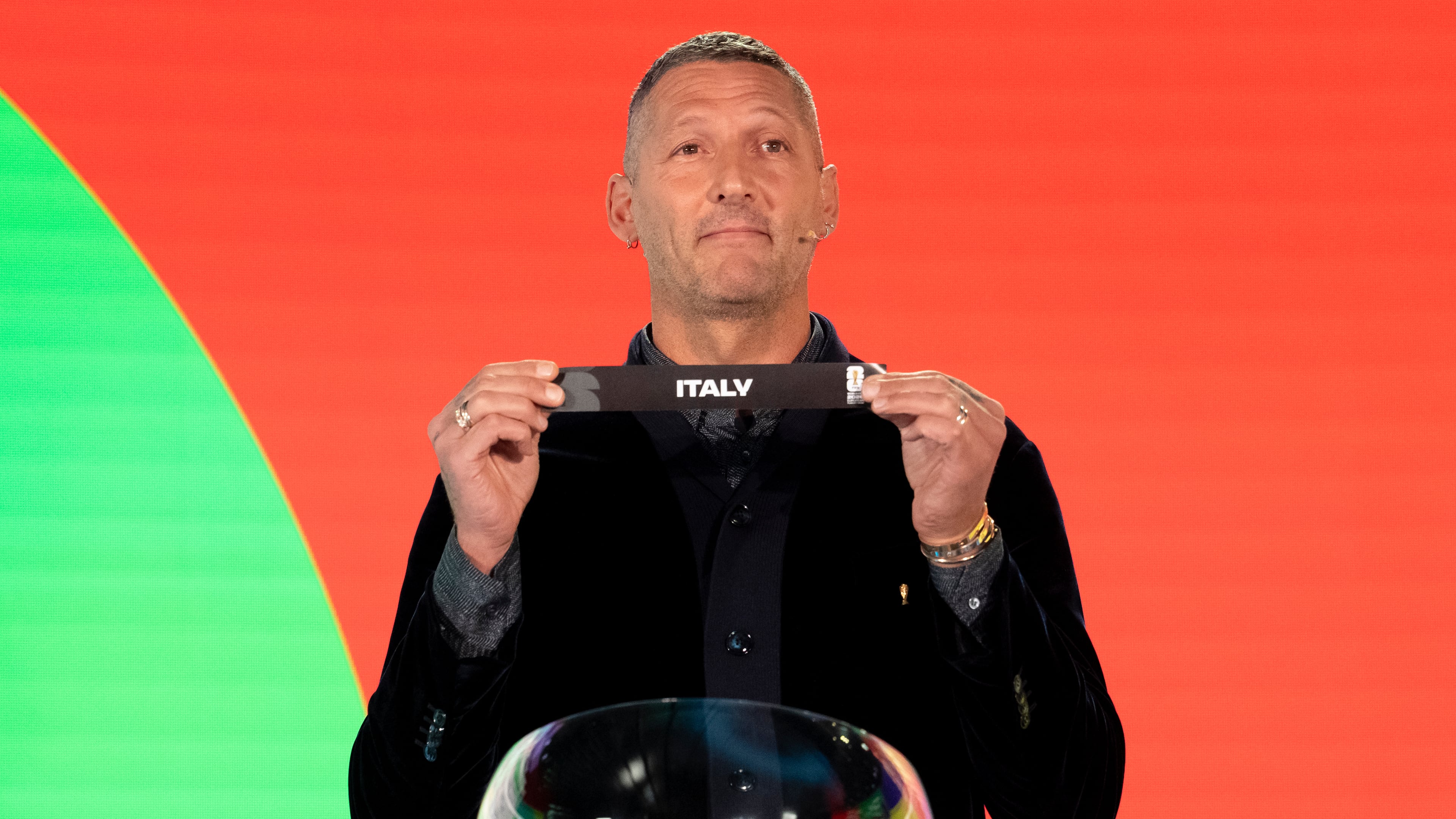 Marco Materazzi draws Italy during the FIFA World Cup 2026 playoff draw in Zurich, Switzerland, Thursday, Nov. 20, 2025. (Claudio Thoma/Keystone via AP)