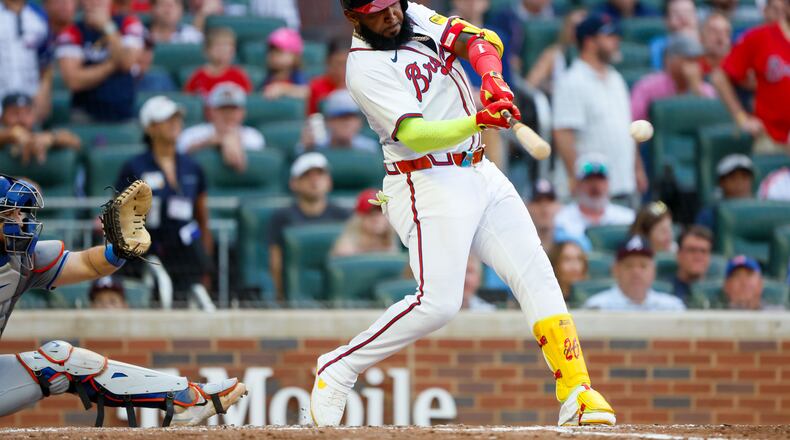 Atlanta Braves designated hitter Marcell Ozuna (20) hits a two-run single during the seventh inning against the New York Mets at Truist Park on Monday, Sept. 30, 2024, in Atlanta. 
(Miguel Martinez/ AJC)