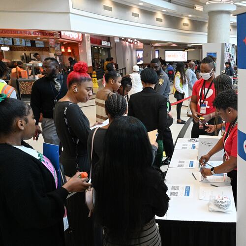 Job seekers check in as they enter 2023 ATL Airport Career Fair at the domestic terminal atrium of Hartsfield-Jackson Atlanta International Airport, Wednesday, March 8, 2023, in Atlanta, GA. (Hyosub Shin / Hyosub.Shin@ajc.com)