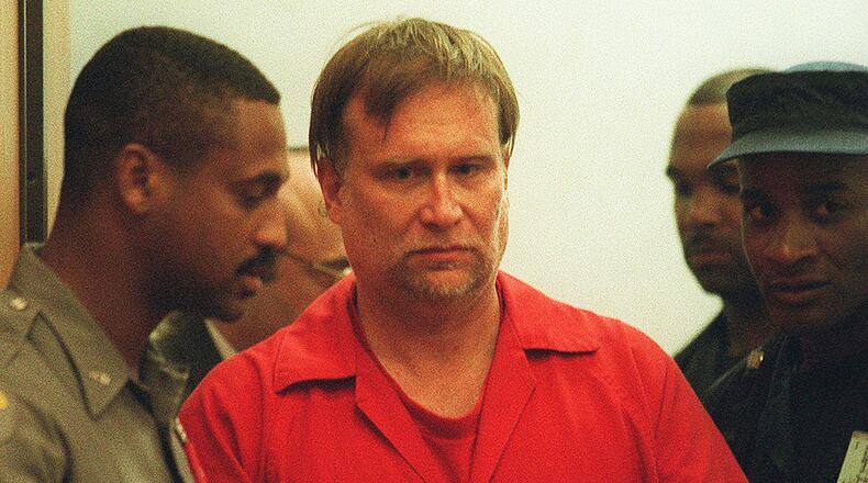 971014 ATLANTA, GA.: -This is Gregory Paul Lawler as seen in a photograph made as he emerged from the hall door and as he was walking into the court room. There is no identification of the correctional officers seen on the left and right of him. --This photo was shot Tuesday, 10/14/97 in the Municipal Court of Atlanta, State of Georgia on the occasion of the State vs Gregory Paul Lawler.