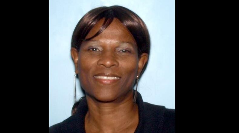 Paulette Smith, seen in a driver's license photo, has been charged with theft and exploitation of an at-risk adult.