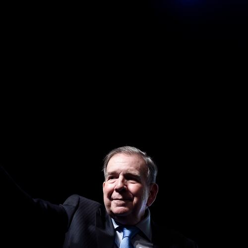 FILE - Venezuela's opposition leader Edmundo Gonzalez waves a Venezuelan flag during a meeting with supporters in Panama City, Jan. 8, 2025. (AP Photo/Agustin Herrera, File)
