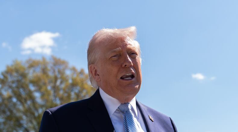 President Donald Trump speaks with reporters during the White House Easter Egg Roll on the South Lawn of the White House, Monday, April 6, 2026, in Washington. (AP Photo/Julia Demaree Nikhinson)