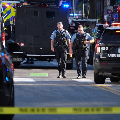 Police respond to a shooting Wednesday, Sept. 2, 2026, in downtown Minneapolis. (AP Photo/Ellen Schmidt)