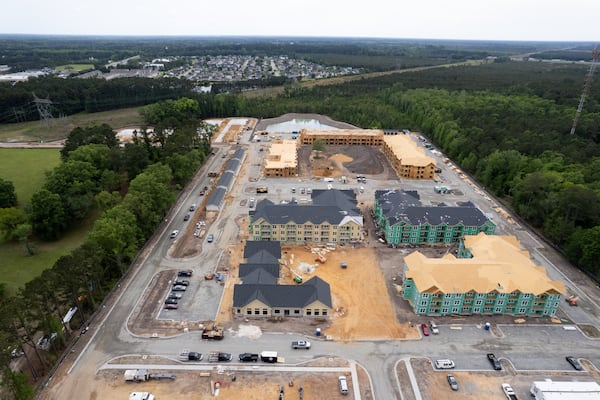 A mixed-use development is under construction in Richmond Hill. (Ben Gray for the AJC)
