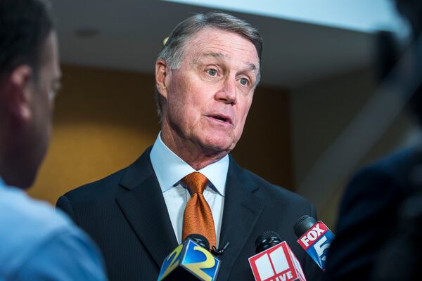 08/06/2019 -- Atlanta, Georgia -- United States Senator David Perdue (R-GA) speaks with media following a talk at the Kiwanis Atlanta Club luncheon meeting at the Loudermilk Conference Center in downtown Atlanta, Tuesday, August 6, 2019.  (Alyssa Pointer/alyssa.pointer@ajc.com)