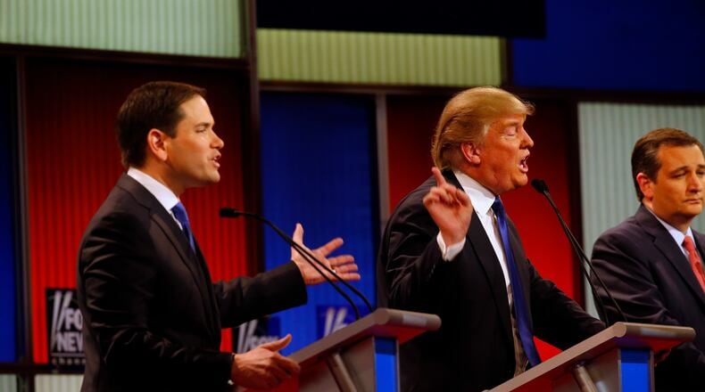 Republican presidential candidates, Sen. Marco Rubio, R-Fla., and businessman Donald Trump argue a point during a Republican presidential primary debate in Detroit. AP/Paul Sancya