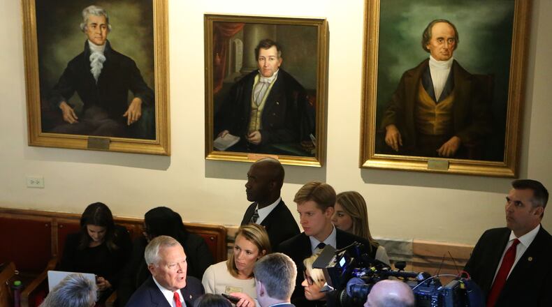 Gov. Nathan Deal in a scrum of reporters after his State of the State address on Wednesday. Bob Andres, bandres@ajc.com