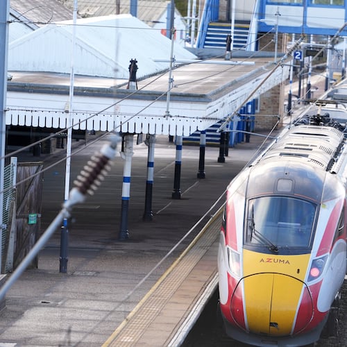 A train is parked at the station after a mass stabbing on a London-bound train in Huntingdon, England, Sunday, Nov. 2, 2025.(AP Photo/Kirsty Wigglesworth)