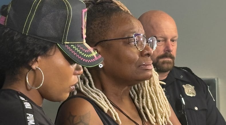 Tanisha Smith (left) and Della Reeves, the victim's friend and mother, spoke during a news conference Thursday afternoon at Atlanta police headquarters.