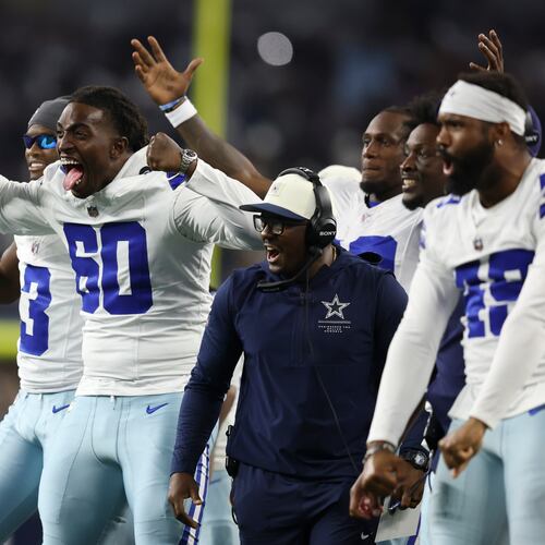 Dallas Cowboys offensive tackle Tyler Guyton (60) celebrates on the sideline after a two-point conversion against the New Orleans Saints during the second half of a preseason NFL football game, in Arlington, Texas, Friday, Aug. 28, 2026. (AP Photo/Gareth Patterson)