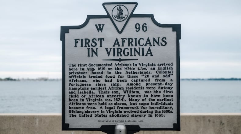 A sign commemorating the arrival of the first Africans is displayed at Chesapeake Bay, in Hampton, Virginia.