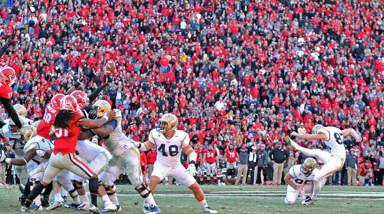 Perhaps the crowning moment of Harrison Butker’s Georgia Tech career, his 53-yard field goal to force overtime against Georgia in 2014. (AJC photo by Hyosub Shin)