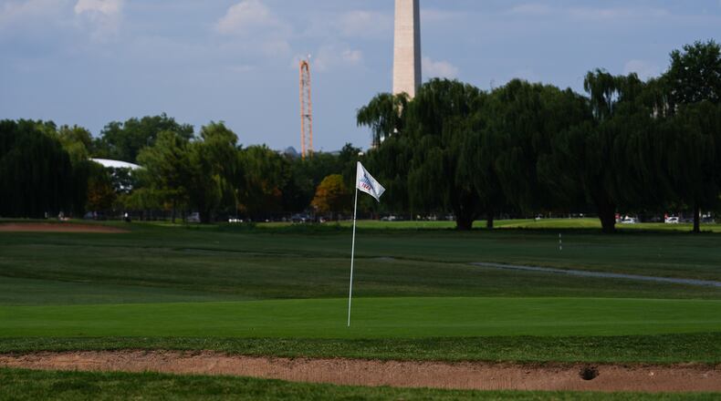 The Washington Monument is seen beyond the East Potomac Park Golf Course, Tuesday, Sept. 1, 2026, in Washington. (AP Photo/Julia Demaree Nikhinson)