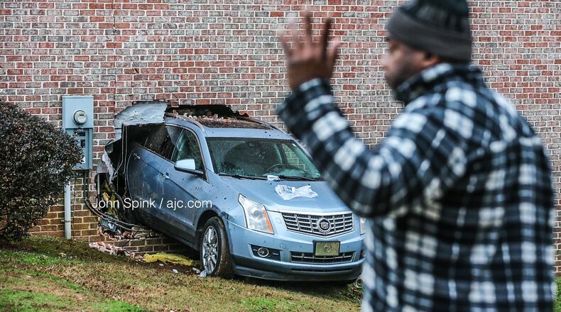 A South Fulton man died Thursday morning after going into cardiac arrest and driving through his neighbor's home.