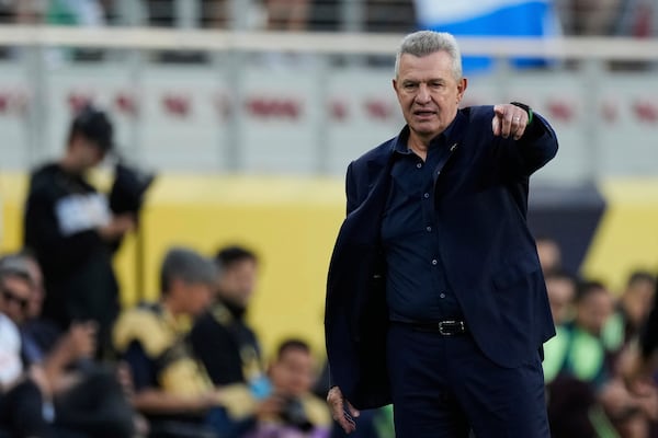Mexico head coach Javier Aguirre gestures during the first half of a CONCACAF Gold Cup semifinal soccer match against Honduras, Wednesday, July 2, 2025, in Santa Clara, Calif. (AP Photo/Godofredo A. Vásquez)