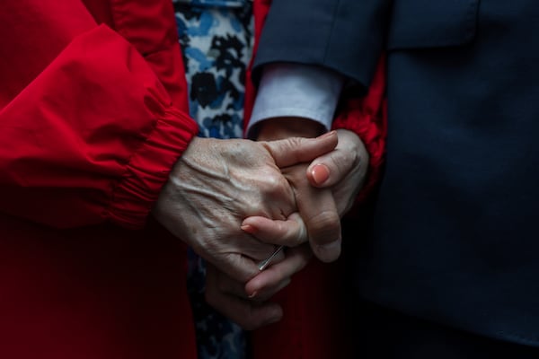 New York City Comptroller Brad Lander holds hands with wife, Meg Barnette, as he leaves Jacob K. Javits Federal Building after being released from arrest outside federal immigration court on Tuesday, June 17, 2025, in New York. (AP Photo/Olga Fedorova)