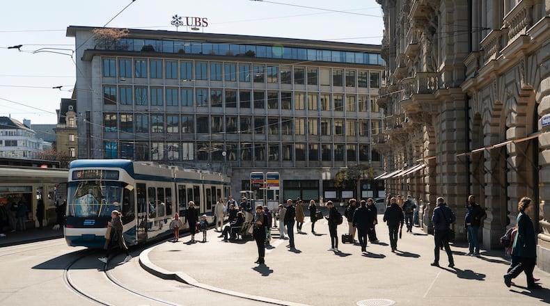 FILE — The UBS bank and Credit Suisse bank buildings in downtown Zurich, Switzerland, on April 4, 2023. The International Monetary Fund's warning follows weeks of turmoil in the global banking sector, which included UBS’s takeover of Credit Suisse. (Marvin Zilm/The New York Times)