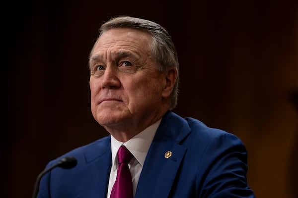 Former U.S. Sen. David Perdue, now President Donald Trump’s ambassador to China, testifies during his nomination hearing in front of the Senate Committee on Foreign Relations in April 2025. (Nathan Posner for the AJC)