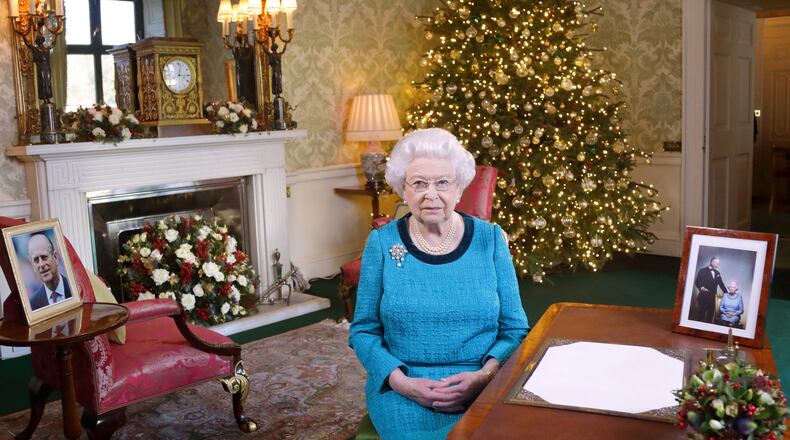 LONDON, ENGLAND - DECEMBER 24: Queen Elizabeth II sits at a desk in the Regency Room after recording her Christmas Day broadcast to the Commonwealth at Buckingham Palace on December 24, 2016 in London, England. (Photo by Yui Mok - WPA Pool/Getty Images)