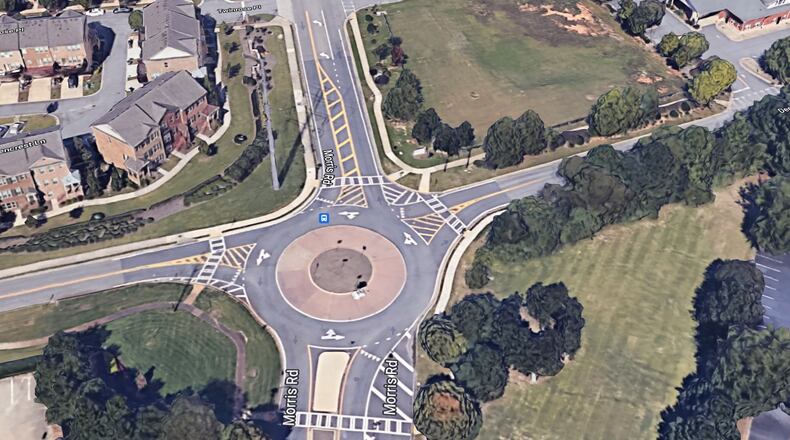 Milton's Morris Road will become a 4-lane divided road with landscaped medians and turn lanes, with a multi-use path on the west side and sidewalk on the east side. The project also includes an expansion of the existing roundabout at Webb Road. (Google Maps)