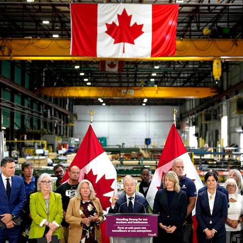 Minister of Finance and National Revenue Francois-Philippe Champagne speaks at a news conference on Canada's response to U.S. tariffs, at a roofing company in Ottawa, on Tuesday, Aug. 25, 2026. (Justin Tang/The Canadian Press via AP)