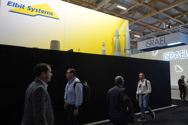 A black wall that blocks the Israeli pavilions has been erected at the Paris Air Show , Monday, June 16, 2025 in Le Bourget, north of Paris. (AP Photo/Michel Euler)